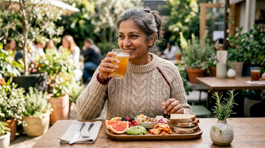 Woman drinking kombucha for gut health